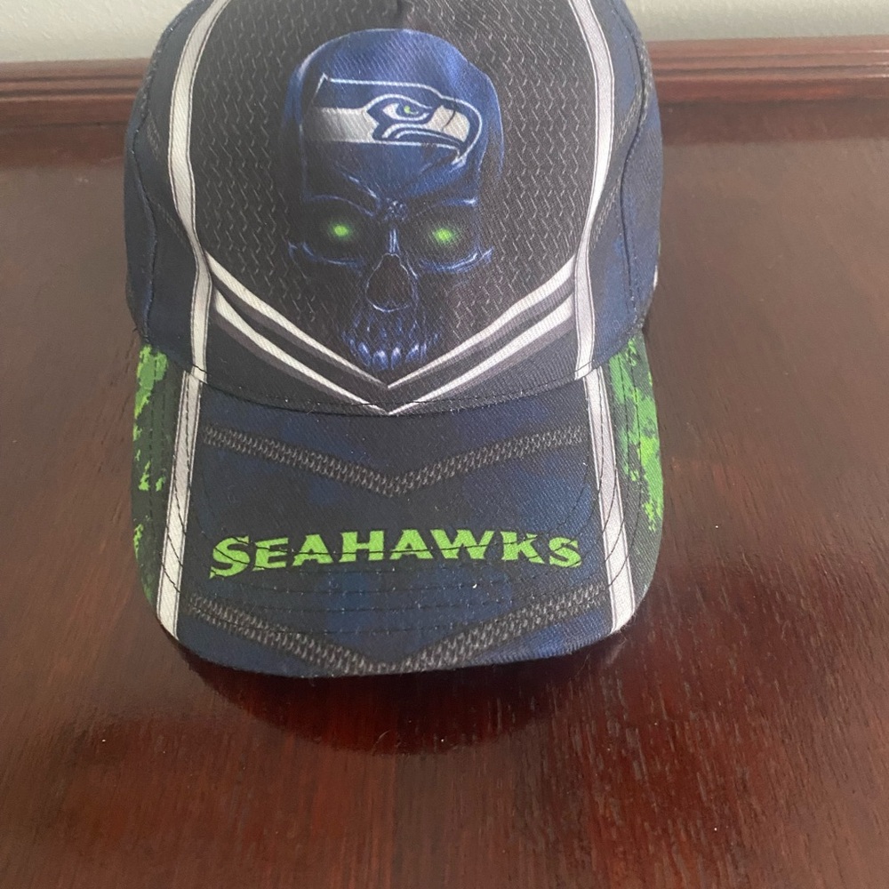 Seahawks Blue and Green Skull Design Cap Has the Name Jim on it